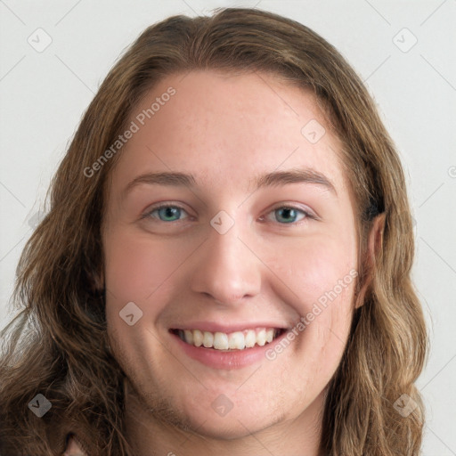 Joyful white young-adult female with long  brown hair and green eyes