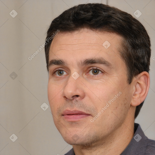 Neutral white adult male with short  brown hair and brown eyes