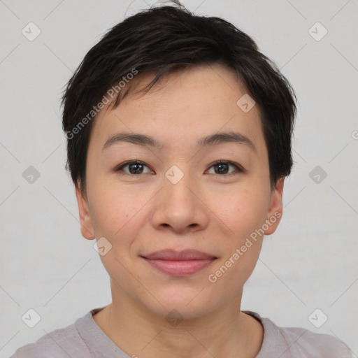 Joyful asian young-adult female with short  brown hair and brown eyes