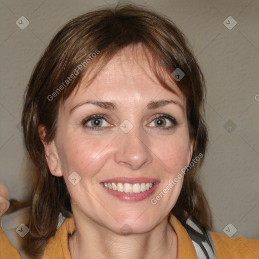 Joyful white young-adult female with medium  brown hair and blue eyes