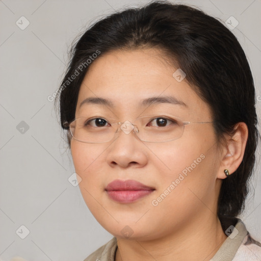 Joyful white adult female with medium  brown hair and brown eyes