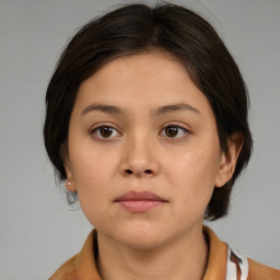 Neutral asian young-adult female with medium  brown hair and brown eyes