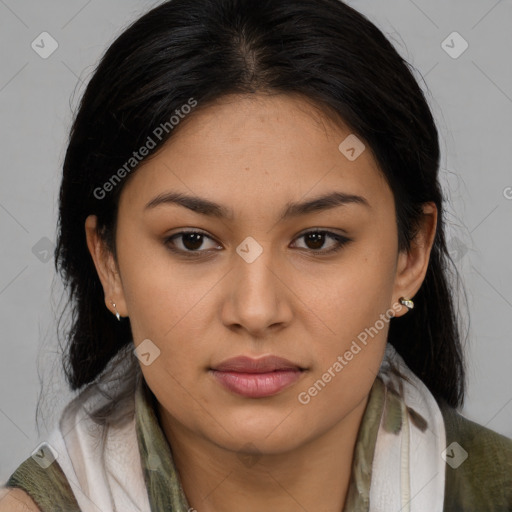 Joyful latino young-adult female with medium  brown hair and brown eyes