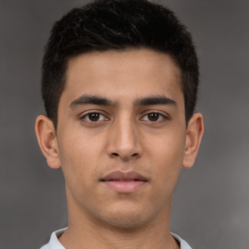 Neutral asian young-adult male with short  brown hair and brown eyes