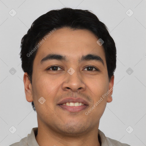 Joyful asian young-adult male with short  black hair and brown eyes