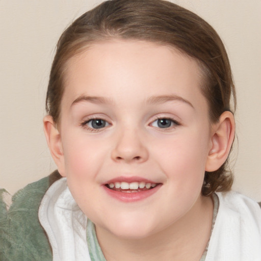 Joyful white child female with medium  brown hair and brown eyes