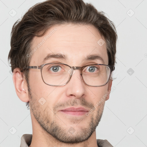 Joyful white adult male with short  brown hair and grey eyes