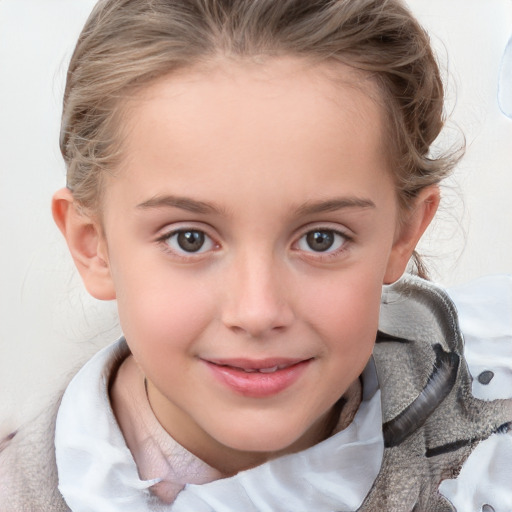 Joyful white child female with medium  brown hair and grey eyes