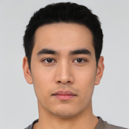 Neutral asian young-adult male with short  black hair and brown eyes