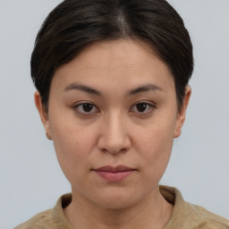 Neutral white young-adult female with short  brown hair and brown eyes