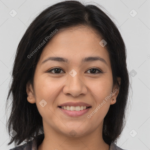 Joyful asian young-adult female with medium  brown hair and brown eyes