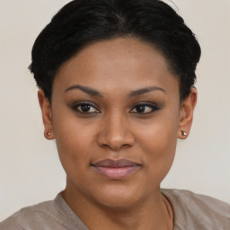 Joyful latino young-adult female with short  brown hair and brown eyes