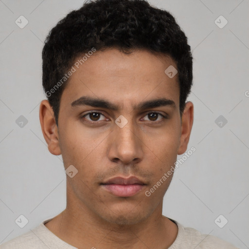 Neutral latino young-adult male with short  brown hair and brown eyes