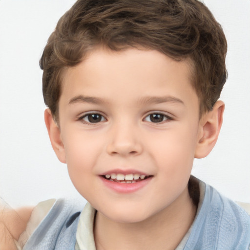 Joyful white child male with short  brown hair and brown eyes