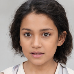 Joyful white child female with medium  brown hair and brown eyes