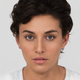 Neutral white young-adult female with short  brown hair and brown eyes