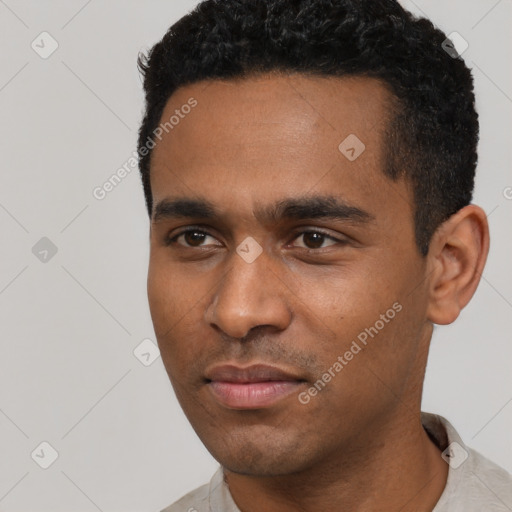 Neutral latino young-adult male with short  black hair and brown eyes