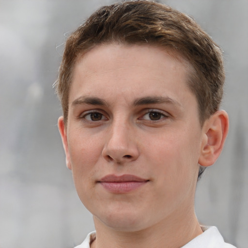 Joyful white young-adult female with short  brown hair and grey eyes