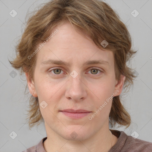 Joyful white adult female with medium  brown hair and grey eyes