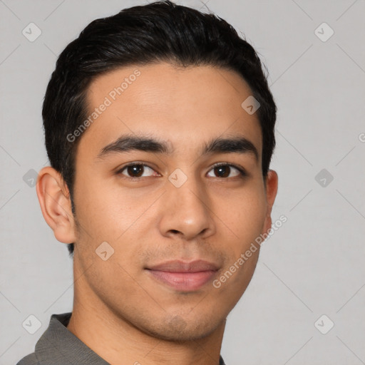 Joyful latino young-adult male with short  brown hair and brown eyes