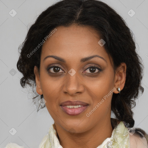 Joyful black adult female with medium  brown hair and brown eyes