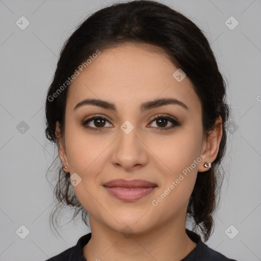 Joyful latino young-adult female with medium  brown hair and brown eyes