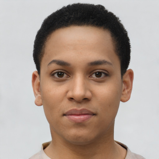 Joyful latino young-adult female with short  black hair and brown eyes