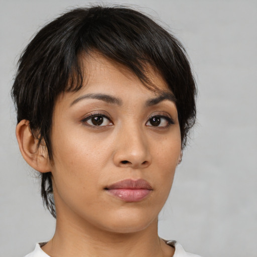 Neutral asian young-adult female with medium  brown hair and brown eyes