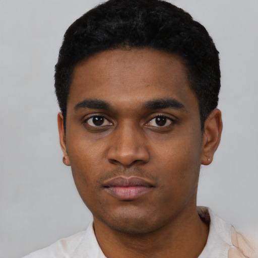 Neutral black young-adult male with short  black hair and brown eyes