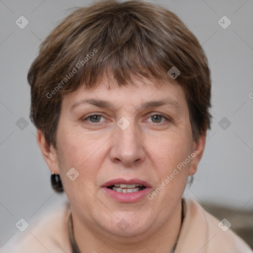 Joyful white adult female with short  brown hair and grey eyes