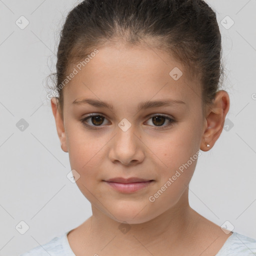 Joyful white child female with short  brown hair and brown eyes