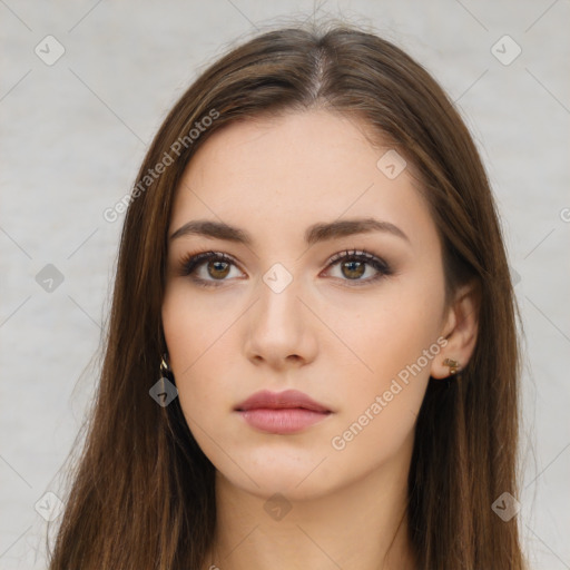 Neutral white young-adult female with long  brown hair and brown eyes