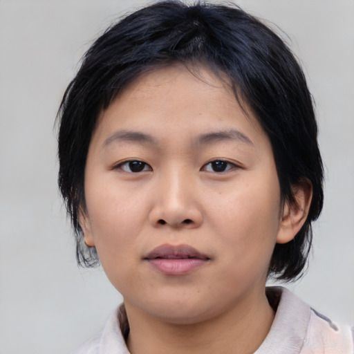 Neutral asian young-adult female with medium  black hair and brown eyes