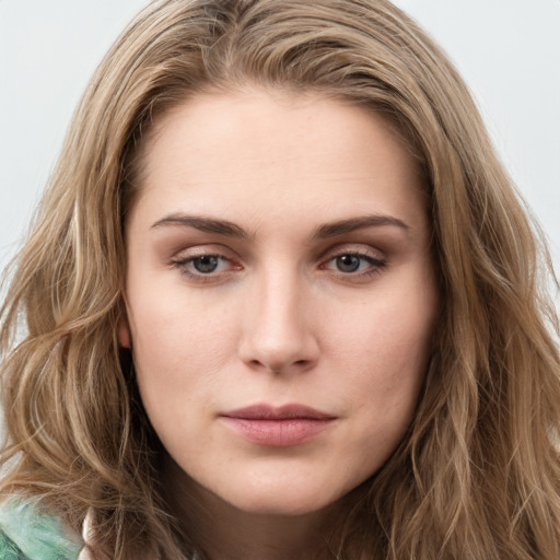 Neutral white young-adult female with long  brown hair and green eyes