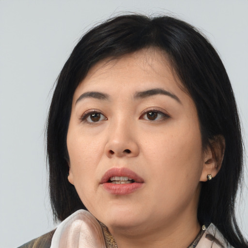 Neutral asian young-adult female with medium  black hair and brown eyes