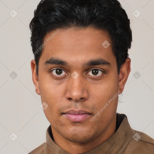 Neutral white young-adult male with short  black hair and brown eyes