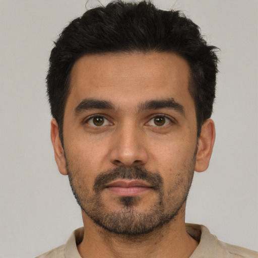 Neutral latino young-adult male with short  black hair and brown eyes