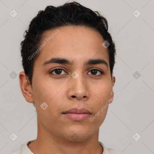 Neutral latino young-adult male with short  brown hair and brown eyes