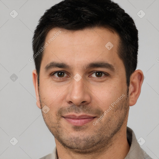 Joyful white young-adult male with short  brown hair and brown eyes