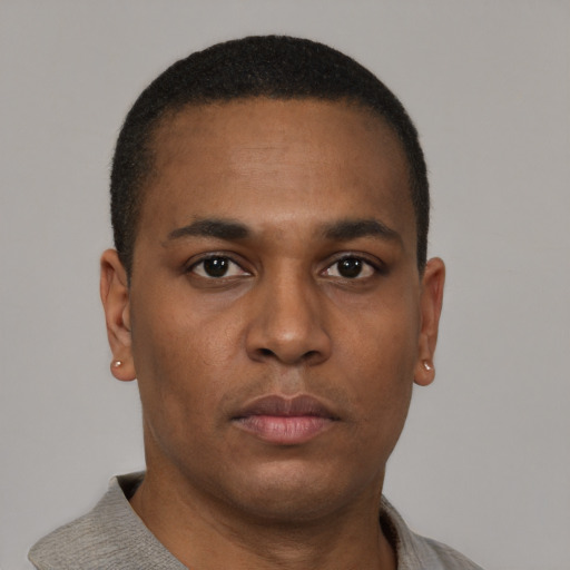 Neutral black young-adult male with short  brown hair and brown eyes