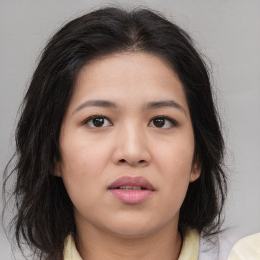 Neutral asian young-adult female with medium  brown hair and brown eyes