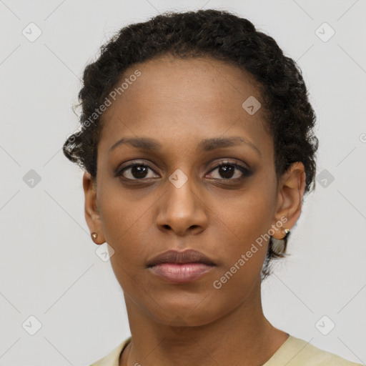 Neutral black young-adult female with short  brown hair and brown eyes