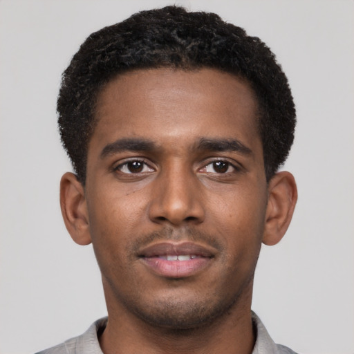 Neutral black young-adult male with short  brown hair and brown eyes
