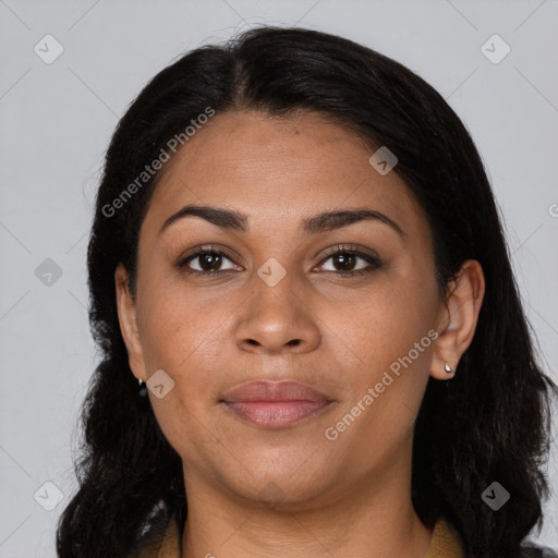 Joyful latino young-adult female with long  brown hair and brown eyes