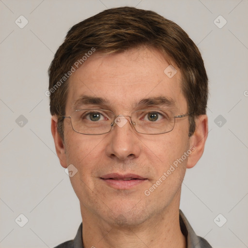 Joyful white adult male with short  brown hair and grey eyes