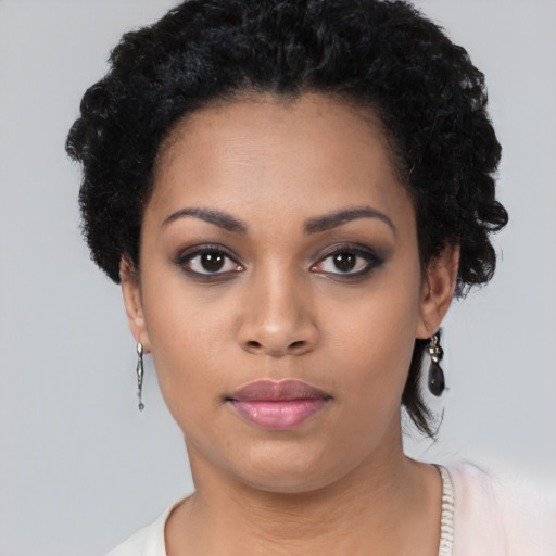 Neutral black young-adult female with short  black hair and brown eyes