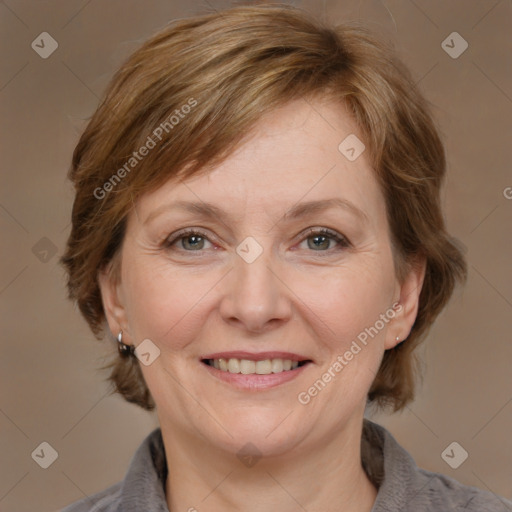 Joyful white adult female with medium  brown hair and brown eyes