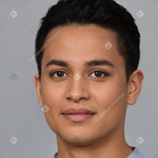 Joyful latino young-adult male with short  black hair and brown eyes