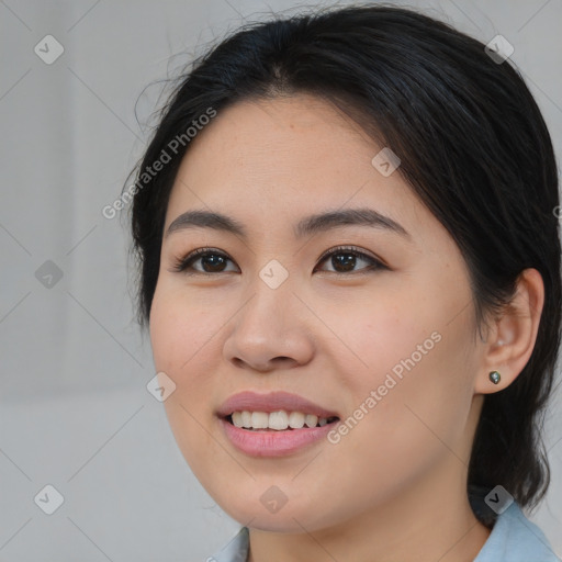 Joyful asian young-adult female with medium  brown hair and brown eyes