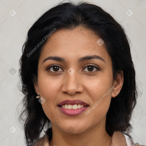 Joyful latino young-adult female with medium  brown hair and brown eyes